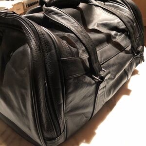 2 leather bags-  $25.00 @